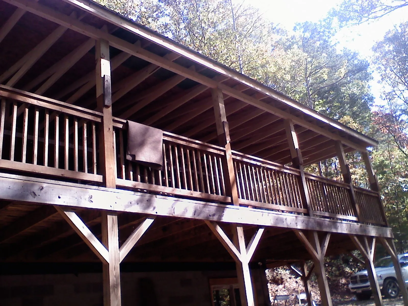 Timber framing under a new elevated porch and deck — Roof Leak Repair in Mc Henry by Roofing Brothers